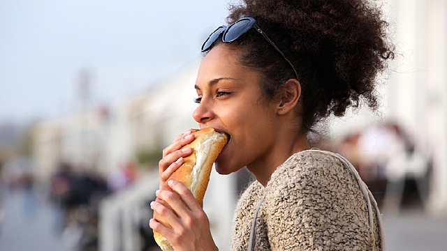 Woman eating a sandwich